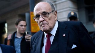 Former New York Mayor Rudy Giuliani departs the U.S. District Courthouse after he was ordered to pay $148 million in his defamation case in Washington, U.S., December 15, 2023.