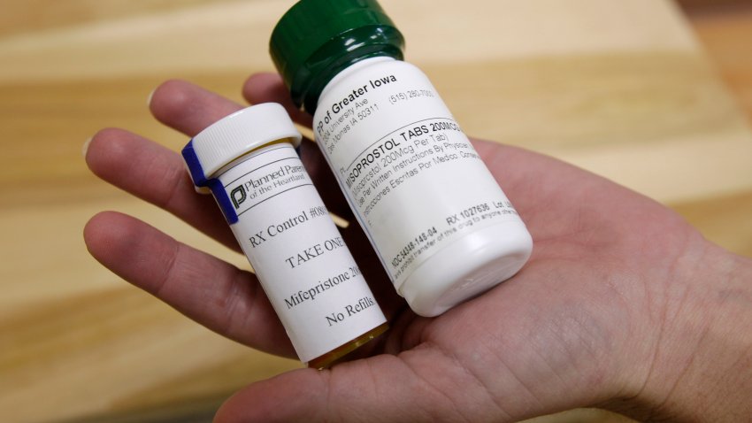 Bottles of abortion pills mifepristone, left, and misoprostol, right, at a clinic, Sept. 22, 2010, in Des Moines, Iowa.