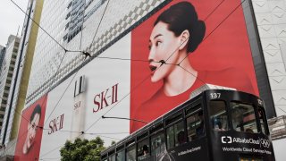 Large advertisement of Japanese luxury skin care products brand, SK-II, in Causeway Bay, Hong Kong.