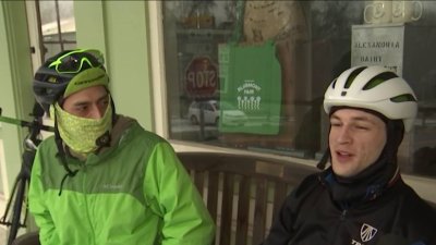 ‘Let's go!': Cyclists bike through snow in Mount Weather