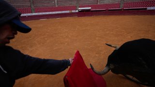 A bullfighter practices at the Plaza de Toros Mexico bullring in Mexico City.
