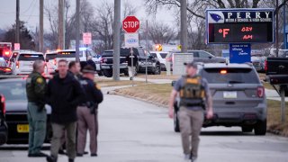 Police respond to Perry High School in Perry, Iowa.
