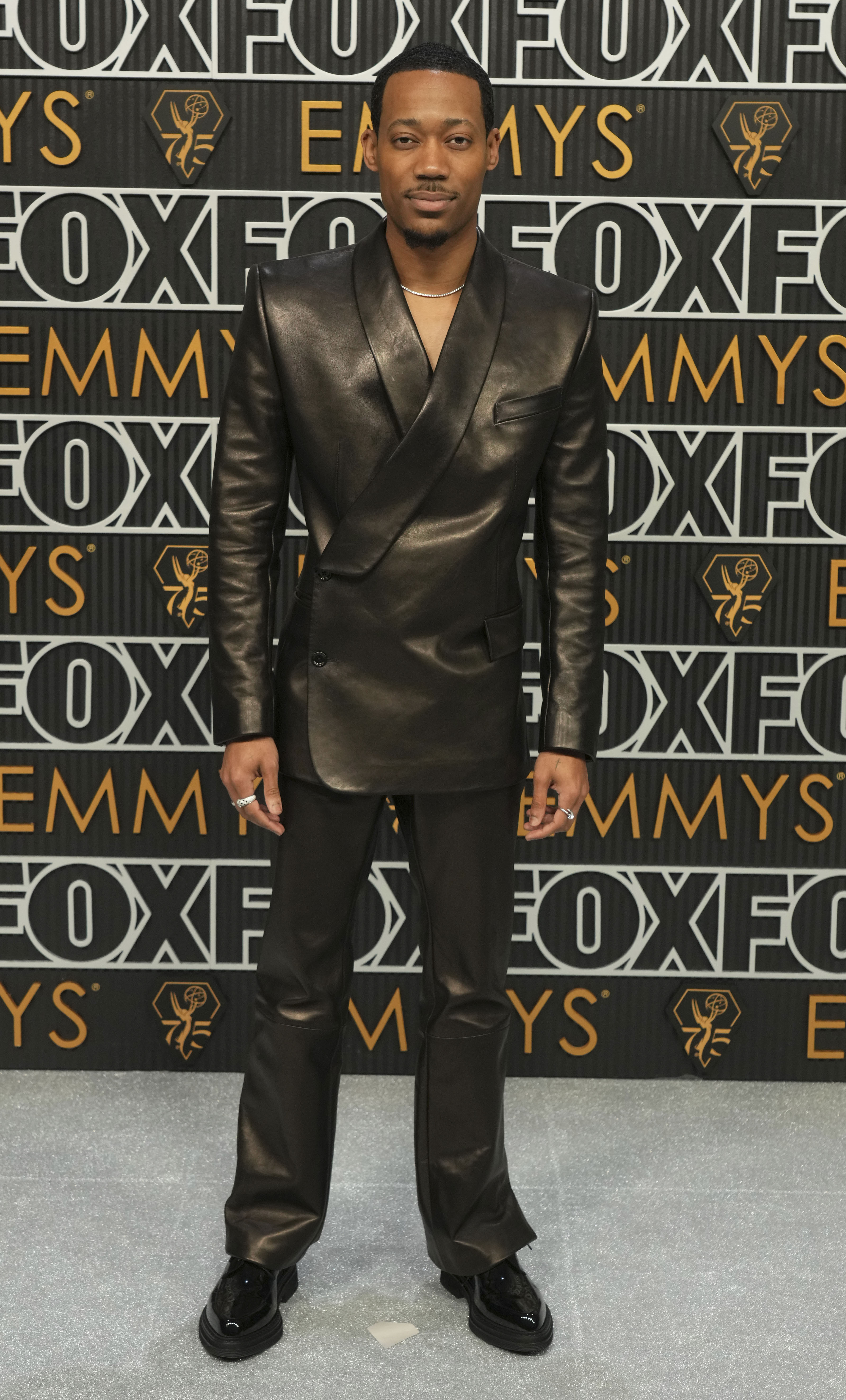 Tyler James Williams poses for a Red Carpet portrait at the 75th Emmy Awards on Monday, Jan. 15, 2024 at the Peacock Theater in Los Angeles. (Photo by Jordan Strauss/Invision for the Television Academy/AP Images)