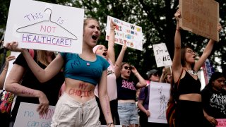 FILE - People rally in support of abortion rights, July 2, 2022, in Kansas City, Mo. Legislative efforts in Missouri and Mississippi this week are attempting to prevent voters from having a say over abortion rights, building on anti-abortion strategies seen in other states, including last year in Ohio.