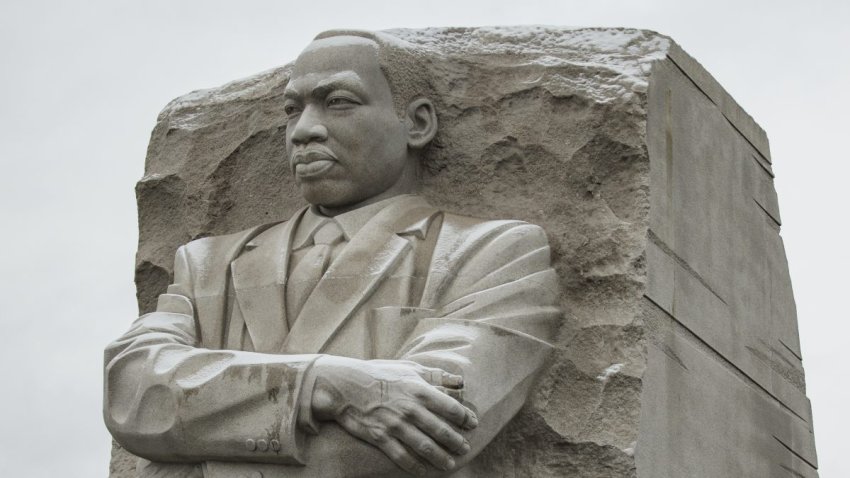 Snow dusts the monument to Martin Luther King Jr. on the National Mall on January 15, 2024 in Washington, D.C.