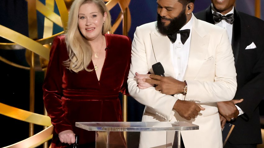 (L-R) Christina Applegate and host Anthony Anderson speak onstage