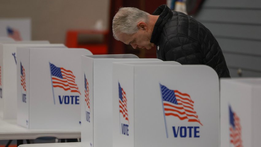 Voters cast their ballots at a polling location setup at Winnacunnet High School on Jan. 23, 2024 in Hampton, New Hampshire. Voters headed to the polls as New Hampshire holds its primary.