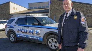 Marion Police Chief John Clair poses outside the Marion Police Department building, Monday, Feb. 5, 2024, in Marion, Va.