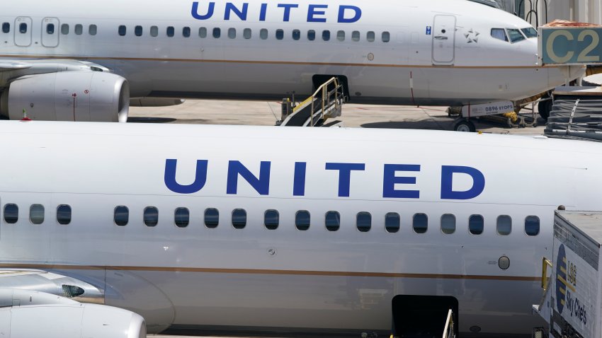 Two United Airlines Boeing 737s are parked at the gate at the Fort Lauderdale-Hollywood International Airport in Fort Lauderdale, Fla., July 7, 2022.