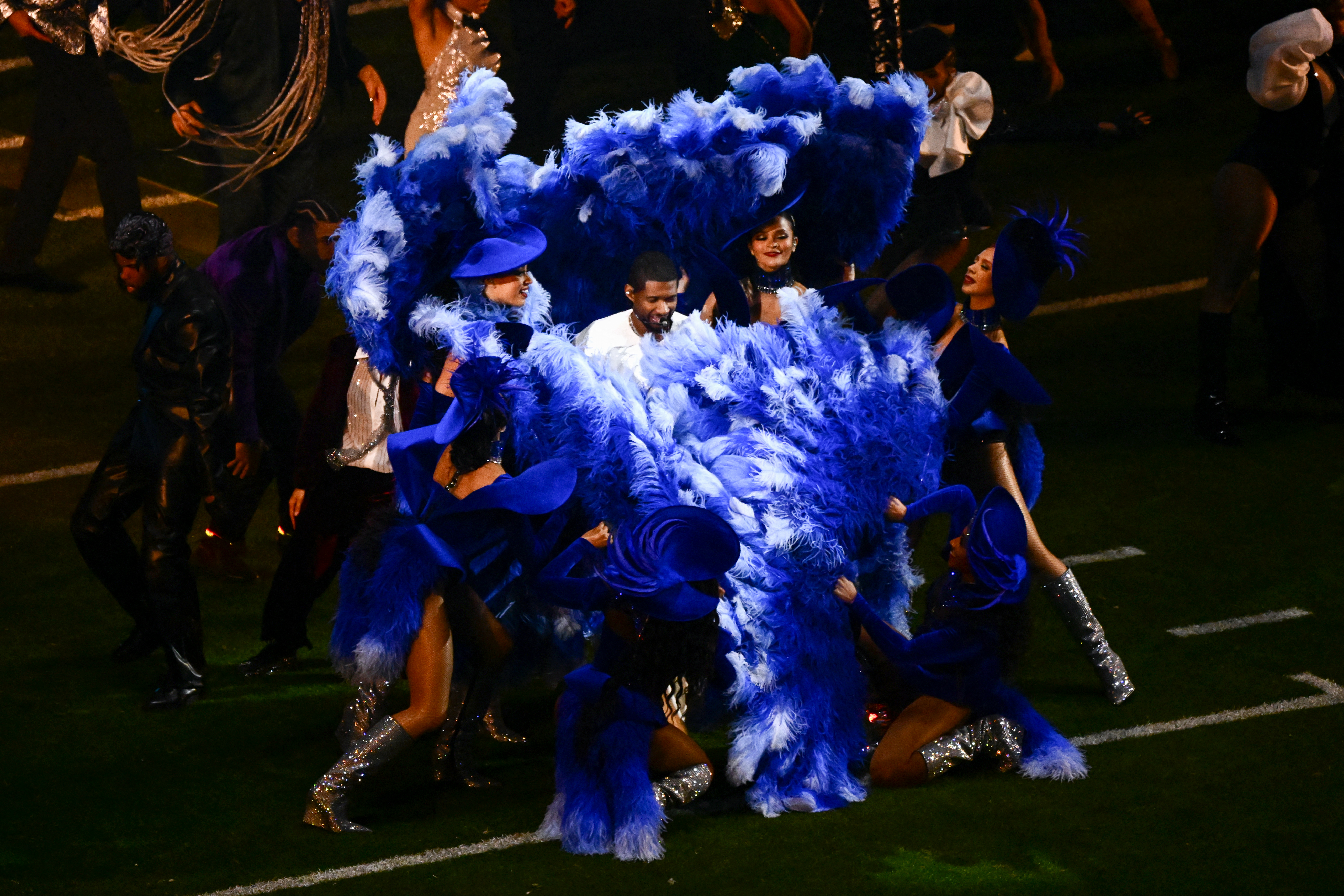 Usher performs during the halftime show of Super Bowl LVIII in Las Vegas, Nevada, Feb. 11, 2024.