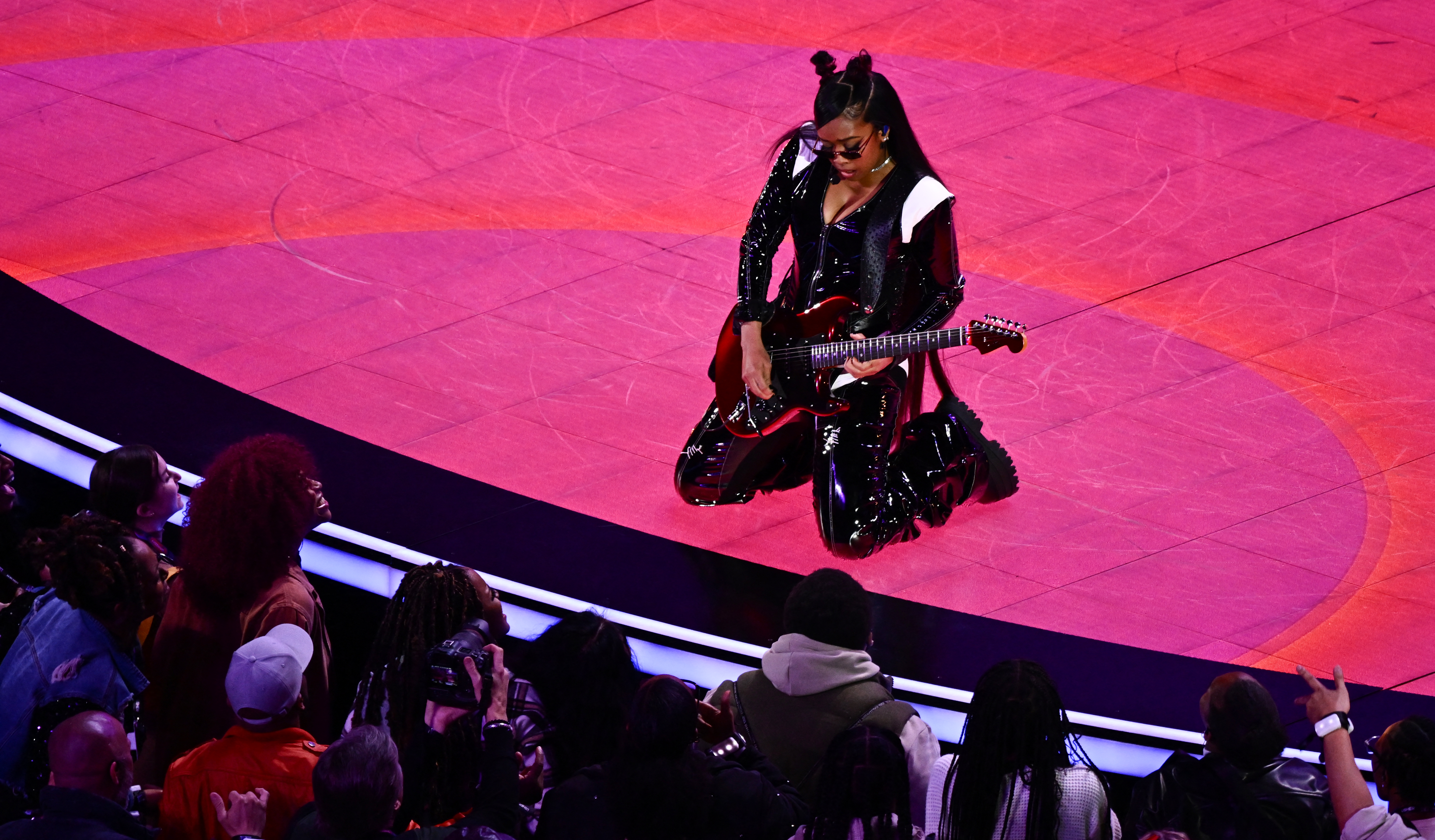 H.E.R. performs during the halftime show of Super Bowl LVIII in Las Vegas, Nevada, Feb. 11, 2024.