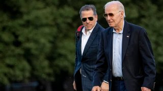 FILE - President Joe Biden, and his son Hunter Biden arrive at Fort McNair, June 25, 2023, in Washington.