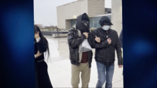 Alexander Smirnov, center, leaves the courthouse on Feb. 20, 2024, in Las Vegas, Nevada.