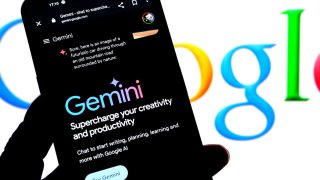 In this photo illustration, a Gemini logo is seen displayed on a smartphone with a Google logo in the background.