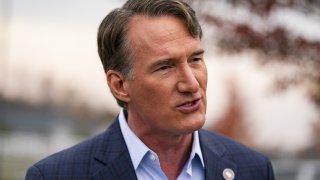 Glenn Youngkin, governor of Virginia, speaks to members of the media during a campaign stop at a polling location in Haymarket, Virginia, Tuesday, Nov. 7, 2023.