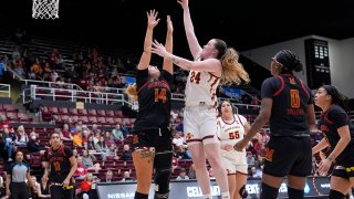 Addy Brown of the Iowa State Cyclones shoots over Allie Kubek of the Maryland Terrapins during the first half in the first round of the NCAA Women's Basketball Tournament.