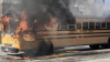 Ex-school bus driver accused of setting fire to buses, one filled with students, as he drove
