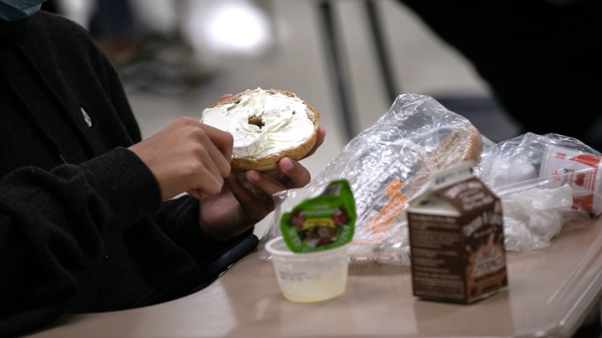 A student prepares lunch in the cafeteria during the first day of school at Stamford High School on September 08, 2020 in Stamford, Connecticut.