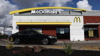 A sign is posted in front of a McDonald’s restaurant in San Leandro, California, Feb. 6, 2024.