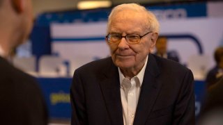 Warren Buffett walks the floor ahead of the Berkshire Hathaway Annual Shareholders Meeting in Omaha, Nebraska on May 3, 2024. 