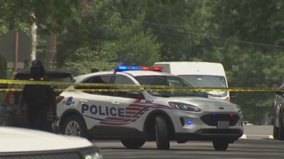 DC officer injured in shooting; 2 suspects in custody