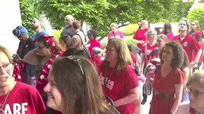 Montgomery County teachers protest at school board meeting as job cuts loom