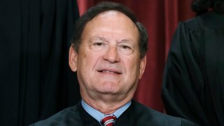 FILE - Justice Samuel Alito joins other members of the Supreme Court as they pose for a new group portrait, Oct. 7, 2022, at the Supreme Court building in Washington.