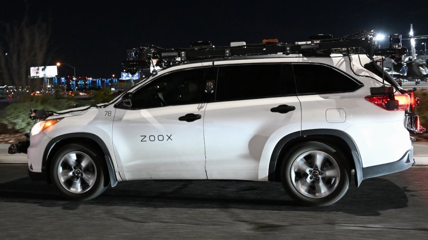 A Toyota sport-utility vehicle modified by Zoox, a subsidiary of Amazon.com, which combines radars, lidar, and cameras to test its software, drives on a road ahead of the Consumer Electronics Show (CES) of Las Vegas, Nevada on January 3, 2023. Zoox, which is developing an autonomous vehicle, is expected to present a robotaxi at CES.