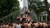 A greasy, monumental ritual at the Naval Academy ends after more than 2 hours