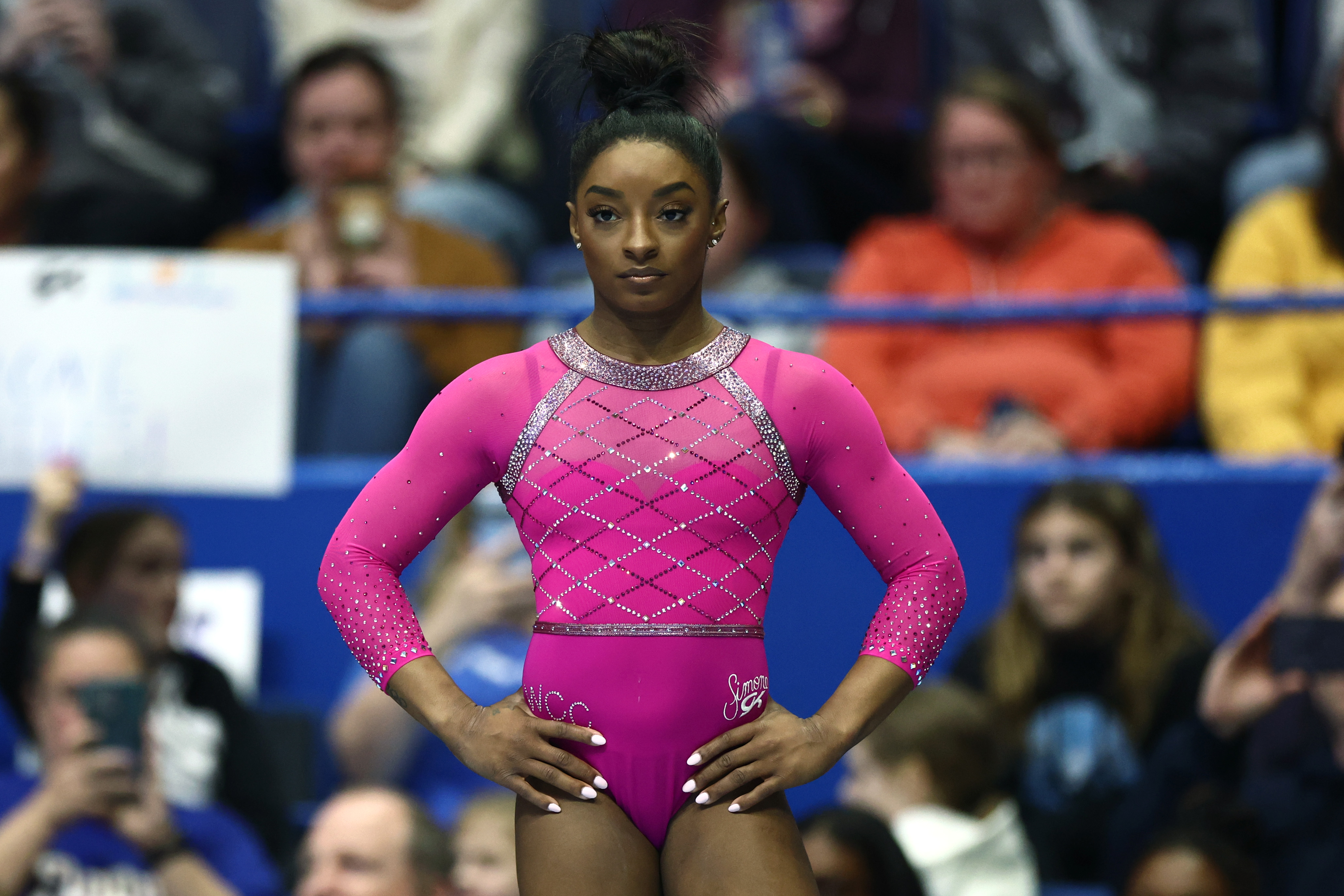 Simone Biles shines in return while Gabby Douglas scratches after a
shaky start at the U.S. Classic