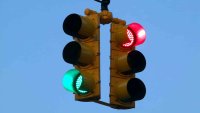 Red, yellow, green … and white? Smarter vehicles could mean big changes for the traffic light