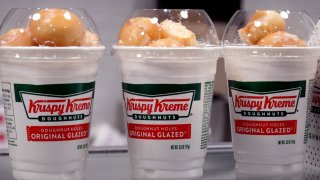 Original Glazed doughnut holes are offered for sale at a Krispy Kreme store in Chicago on May 5, 2021.