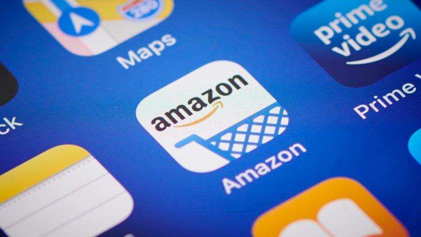 Close-up detail of the Amazon app icon on an Apple iPhone 12 Pro smartphone screen, on November 11, 2020.
