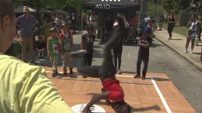 Local breakdancers celebrate the sport's first Olympics