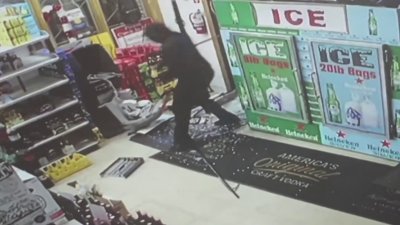 Thieves use truck to rip ATM out of Riverdale liquor store