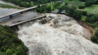 Heavy rains cause high water levels at the Rapidan Dam near Mankato, Minn.