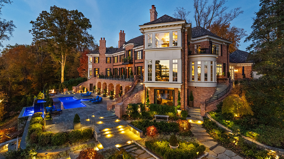 Backyard view of the mansion, including an infinity pool and staircase. (Credit: Heider)