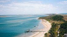Cape Lookout National Seashore in the Outer Banks North Carolina. High angle view of coastline and ocean with copy space in sky.
