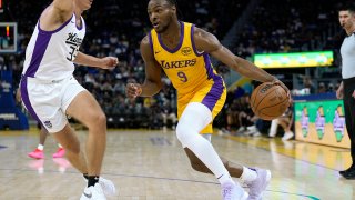 SAN FRANCISCO, CALIFORNIA - JULY 06: Bronny James Jr. #9 of the Los Angeles Lakers drives to the basket on Dane Goodwin #33 of the Sacramento Kings during the second half of a 2024 California Classic summer league game at Chase Center on July 06, 2024 in San Francisco, California. NOTE TO USER: User expressly acknowledges and agrees that, by downloading and or using this photograph, User is consenting to the terms and conditions of the Getty Images License Agreement. (Photo by Thearon W. Henderson/Getty Images)