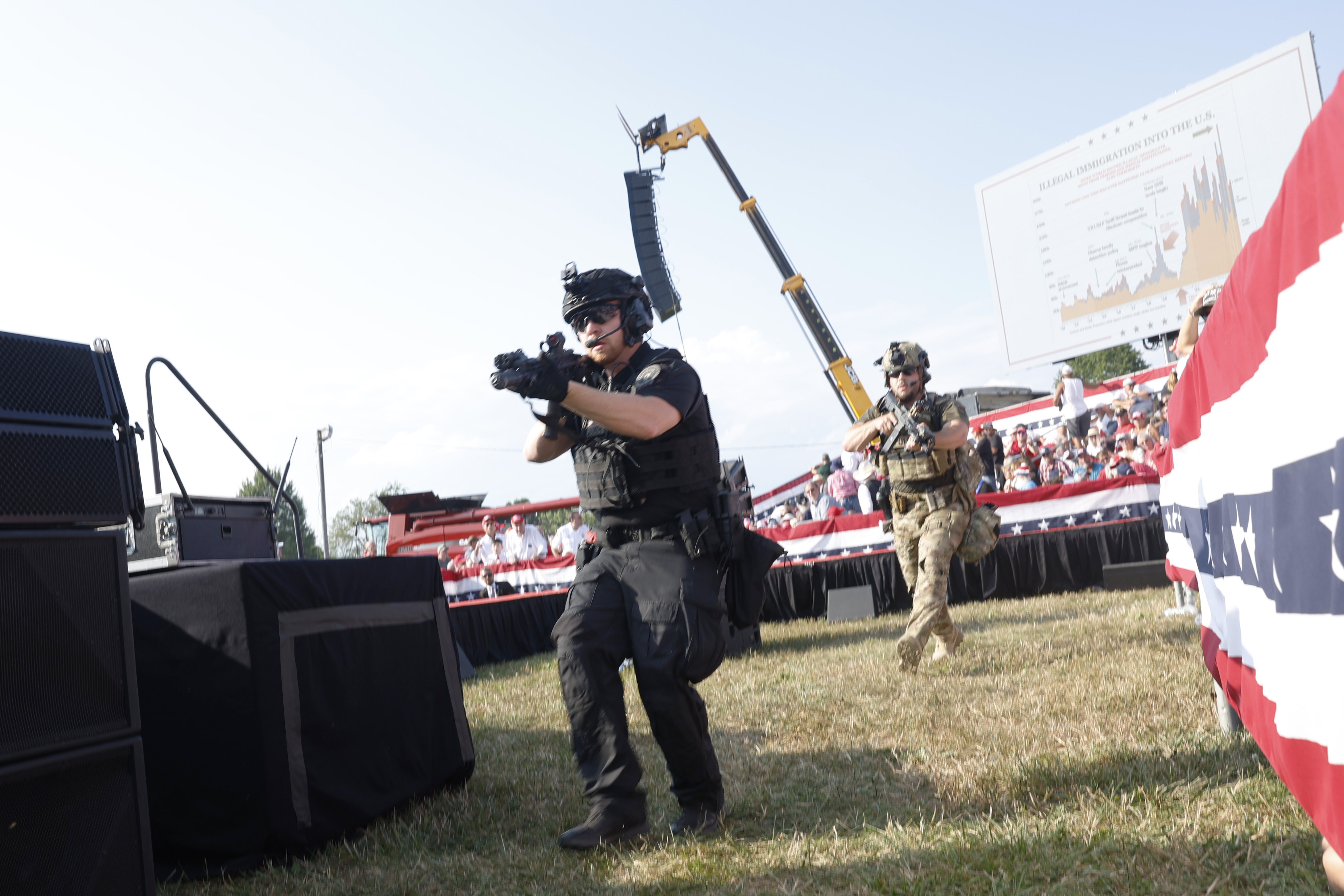 Law enforcement officers move during a rally on July 13, 2024 in Butler, Pennsylvania.