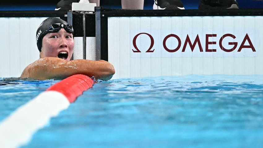 Torri Huske celebrates after winning the final of the women’s 100m butterfly swimming event during the Paris 2024 Olympic Games at the Paris La Defense Arena in Nanterre, west of Paris, on July 28, 2024.