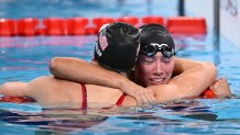 US' Torri Huske (R) celebrates with US' Gretchen Walsh