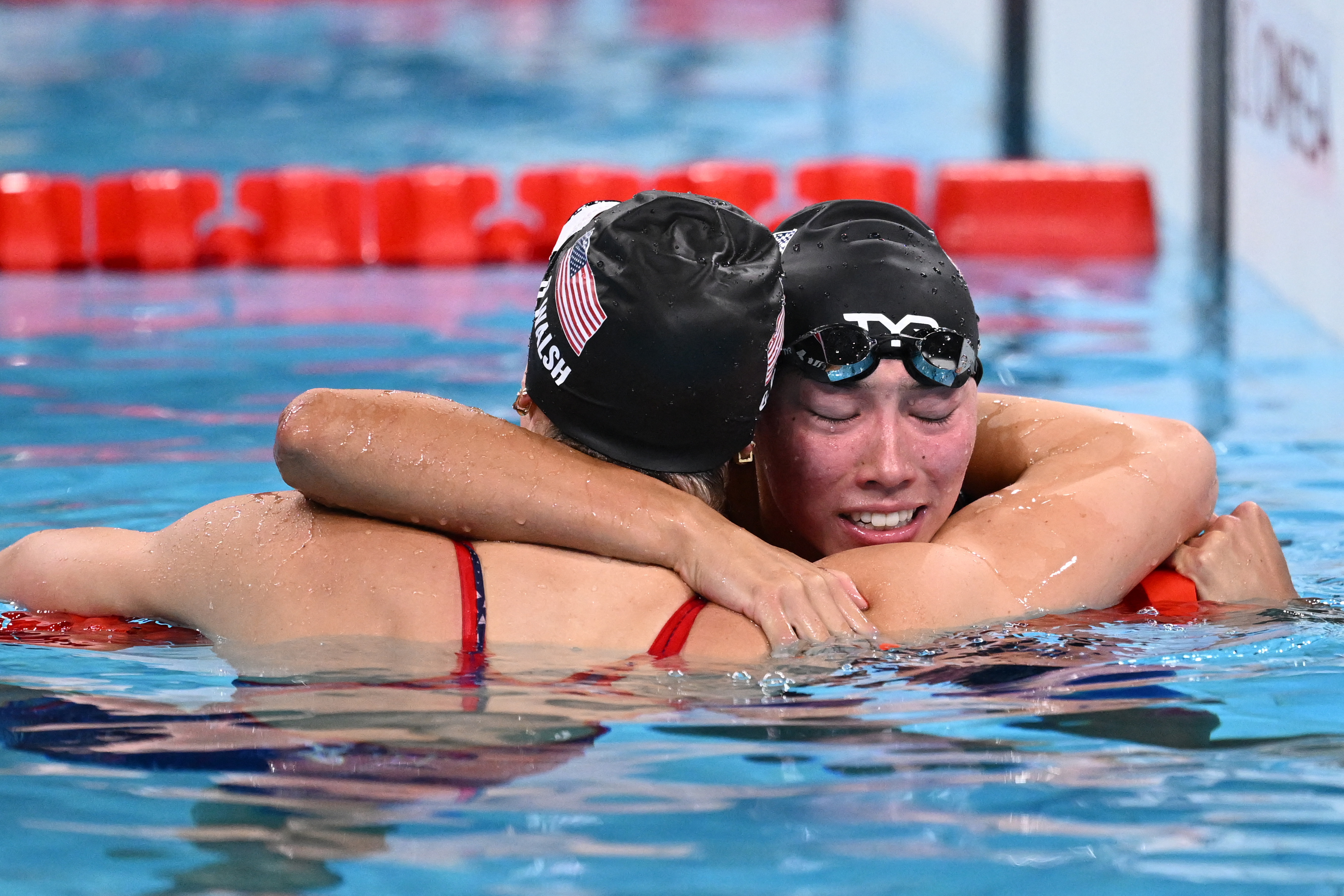 WATCH: Americans Torri Huske and Gretchen Walsh take gold and silver in women's 100m butterfly
