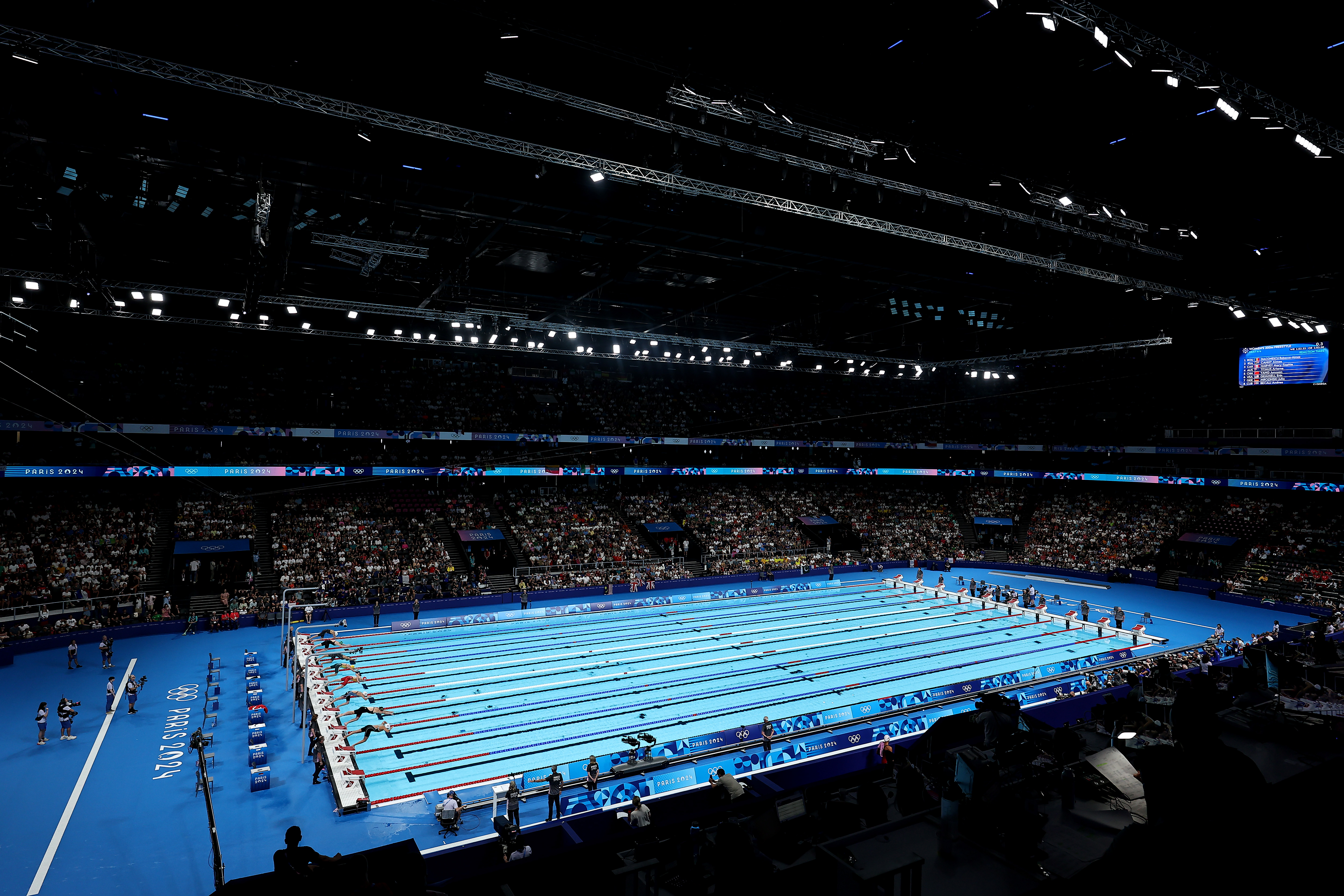 Many top swimmers are going slower than expected in the Olympic pool. Is it too shallow?
