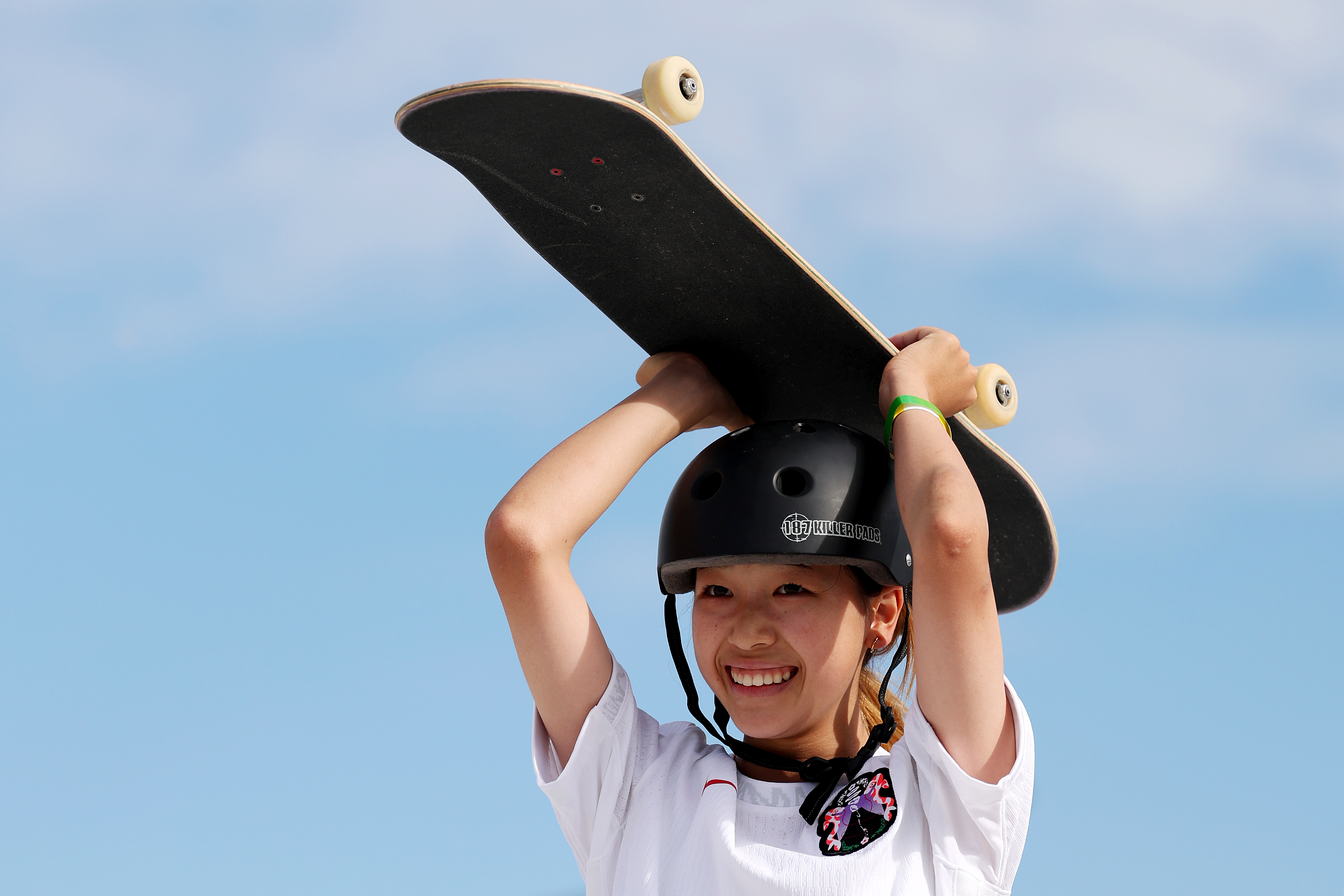 Japan's 14-year-old Coco Yoshizawa earns gold in street skateboarding
