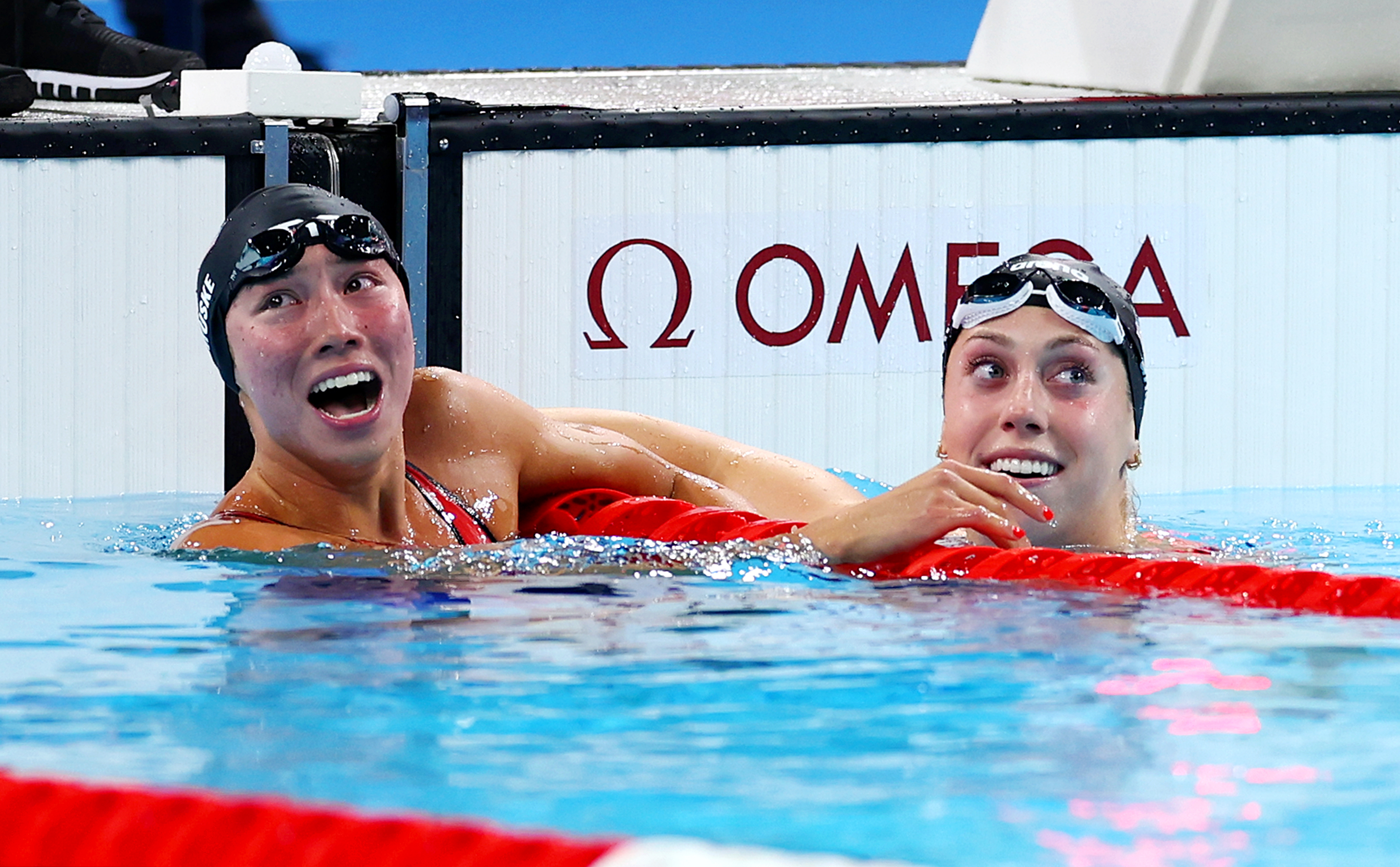Torri Huske inches out teammate Gretchen Walsh to take Olympic gold in 100m butterfly final