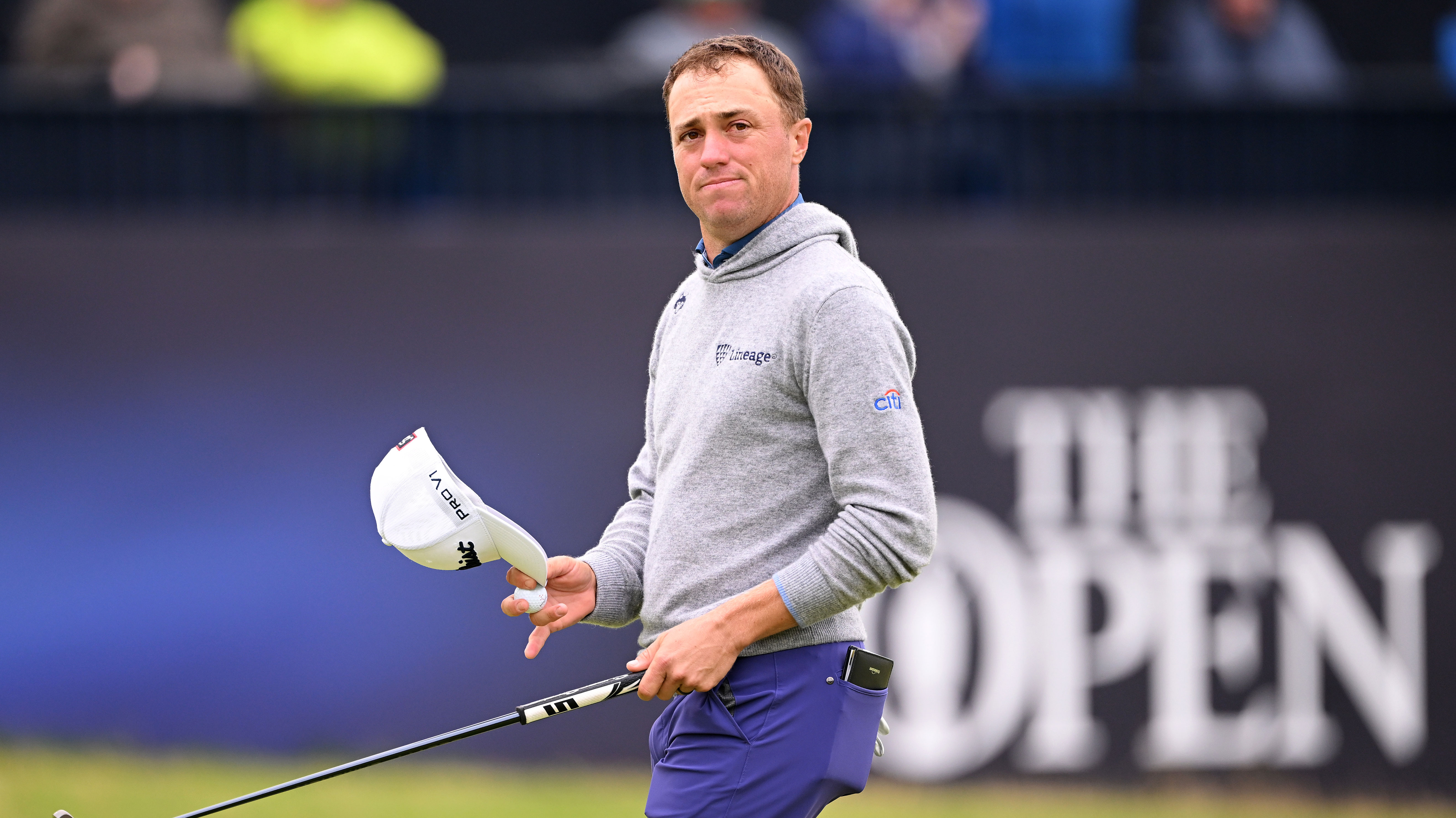 Justin Thomas steadies himself in wind and rain for early British Open lead