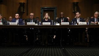 Chief Executive Officers of pharmaceutical companies testify before the Senate Finance Committee on “Drug Pricing in America: A Prescription for Change, Part II” February 26, 2019 in Washington, DC. From left to right are Richard A. Gonzalez, chairman and CEO of AbbVie Inc; Pascal Soriot, executive director and CEO of AstraZeneca; Giovanni Caforio, chairman of the board and CEO of Bristol-Myers Squibb Co.; Jennifer Taubert, executive vice president and worldwide chairman of Janssen Pharmaceuticals, Johnson & Johnson; Kenneth C. Frazier, chairman and CEO of Merck & Co. Inc.; Albert Bourla, CEO of Pfizer and Olivier Brandicourt, CEO of Sanofi.