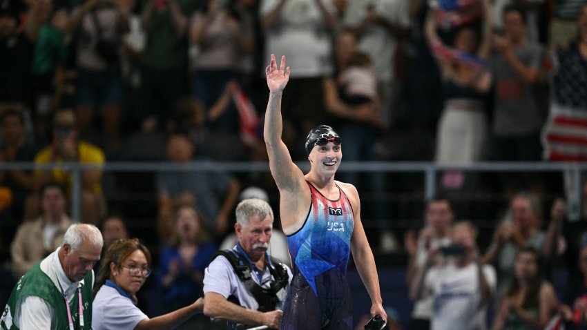 Katie Ledecky waves