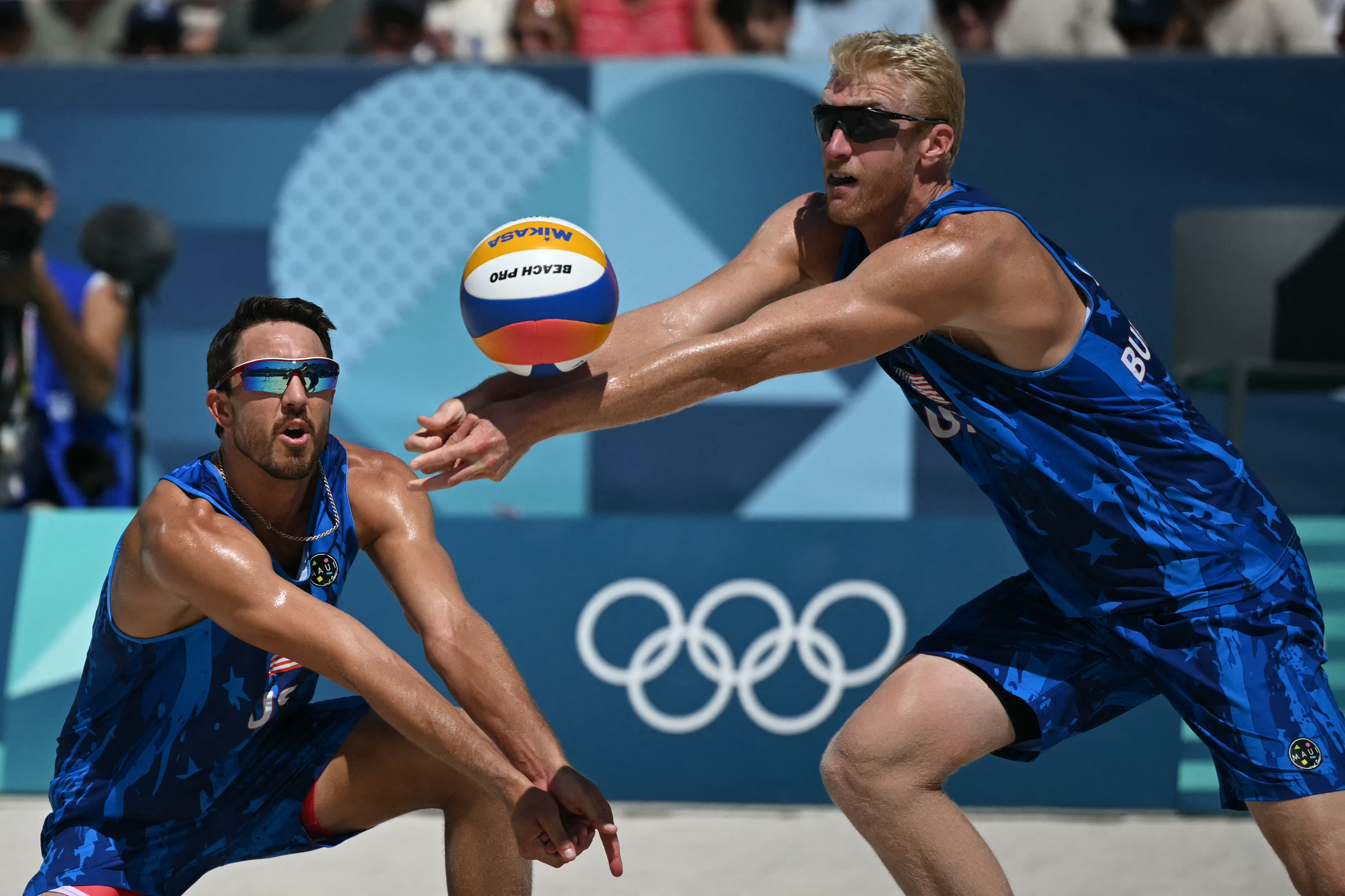 Budinger and Evans fall to defending gold medalists in beach volleyball round of 16